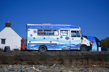 Blue and white ice cream van

